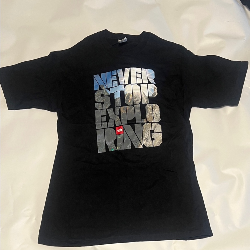 The North Face Black Graphic 'Never Stop Exploring' Tee with Blue Accents